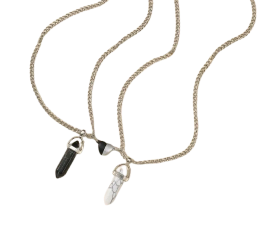 Set de collar con dijes de cuarzo y corazón partido