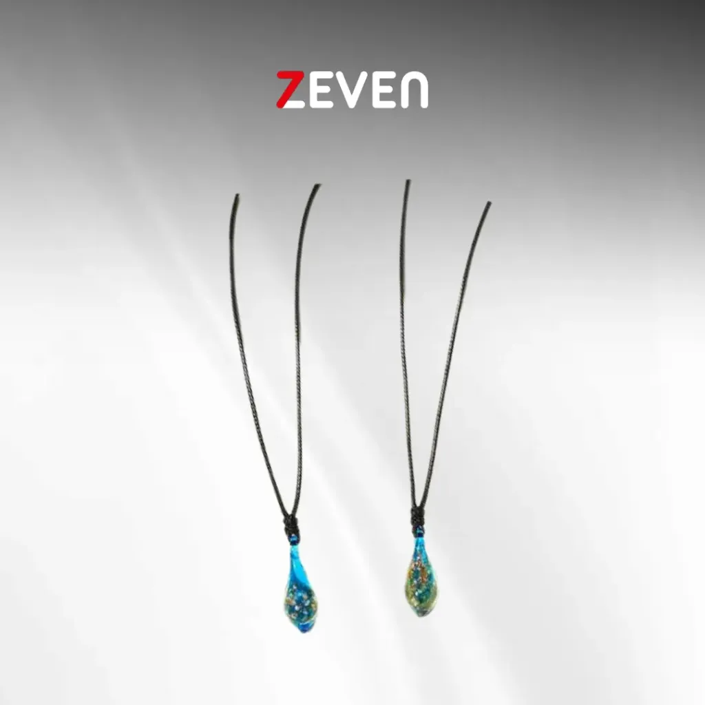 Set de collares con dijes cristal de color azul turquesa con detalles dorados 