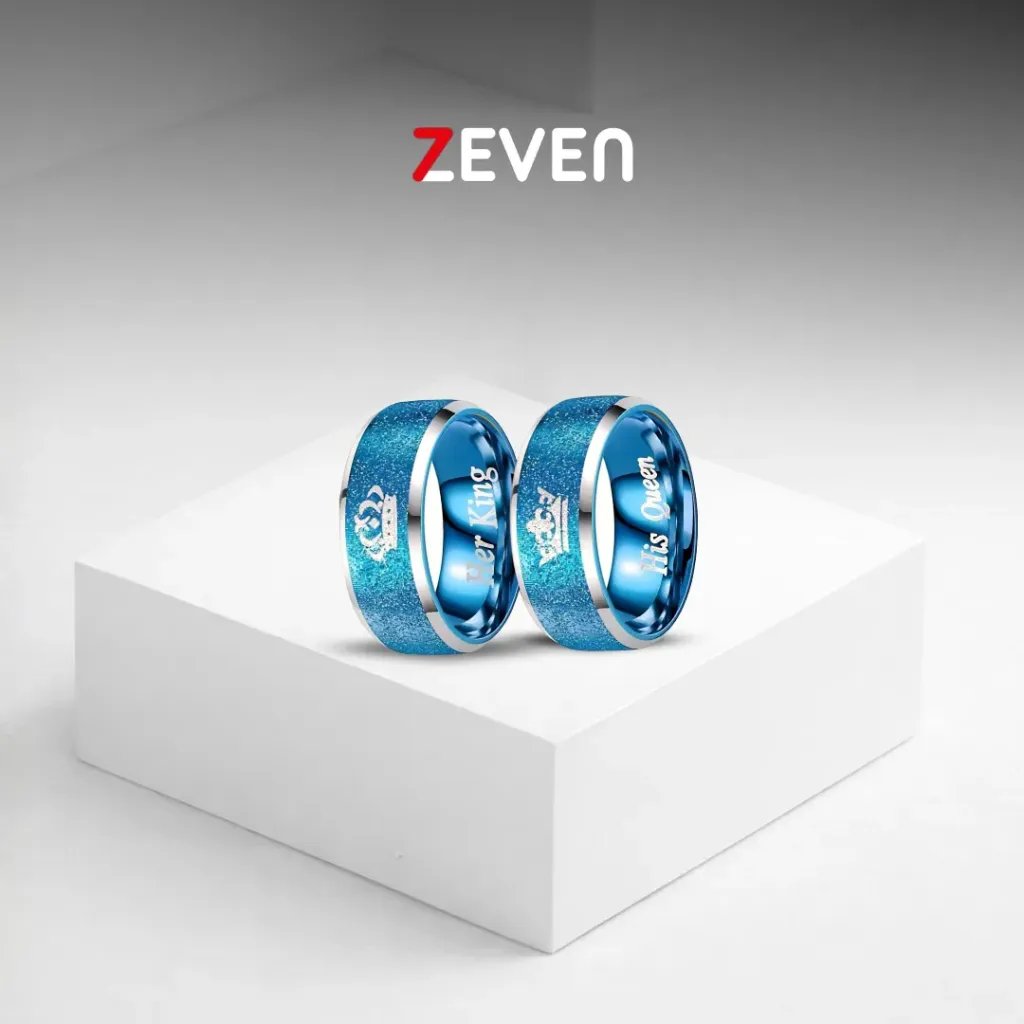 Set de dos anillos azul y plateado con grabados de "Her King" y "His Queen".