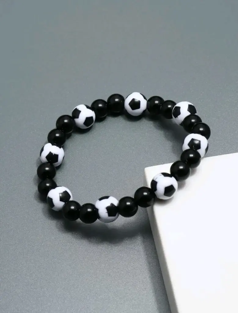 Pulsera plástica con diseño de pelota