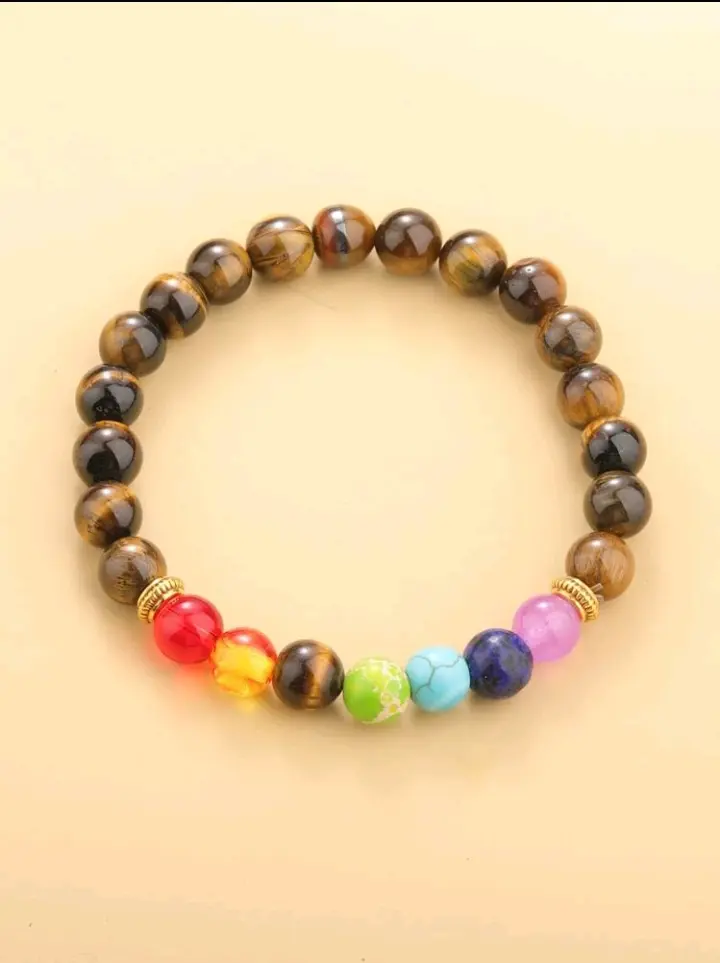 Pulsera de piedras cafe con 7 chakras