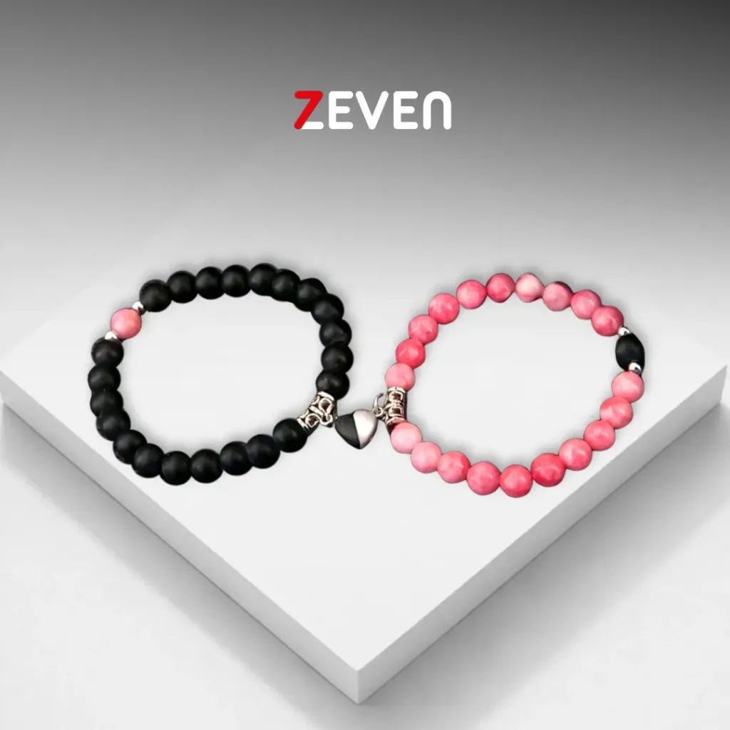 Set de pulseras de piendras rosadas y negras con corazón de iman