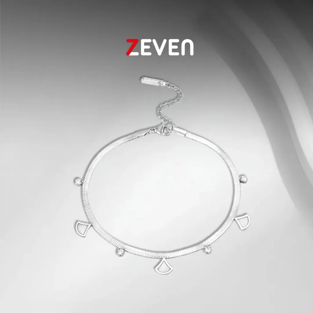 Tobillera de acero con dijes colgantes