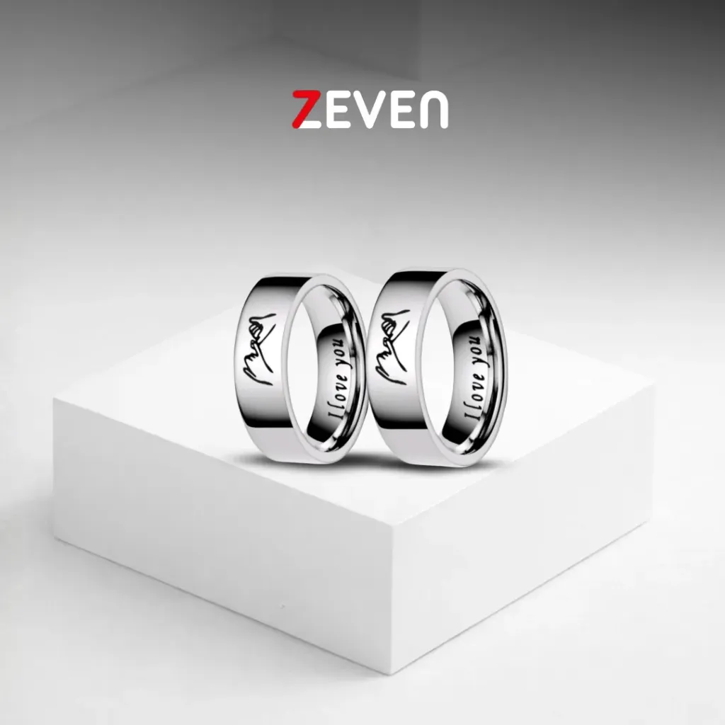 Set de dos anillos plateados con grabado de "I love you" dentro del anillo.